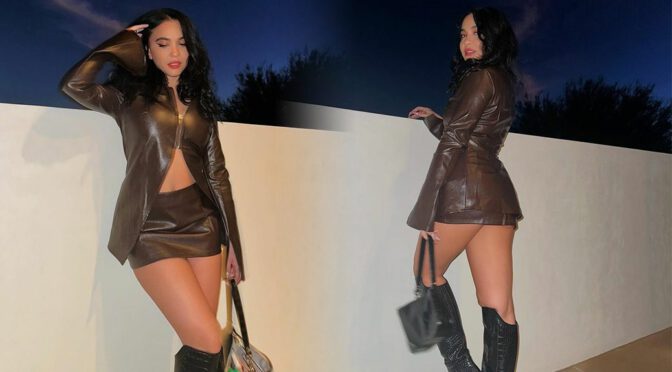 Provocative Elegance: Stella Hudgens Flaunts Sexy Leather Skirt and Boots in Steamy Photos