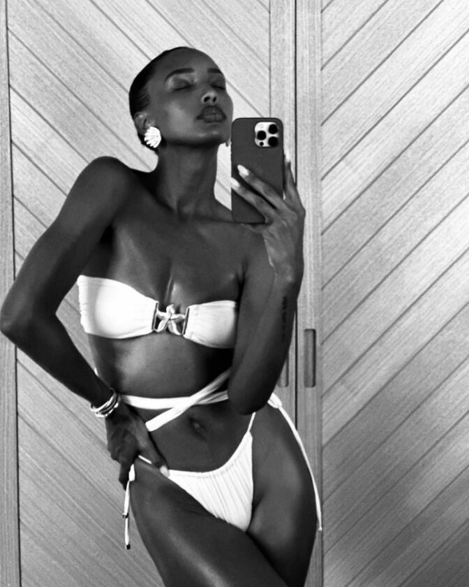 Sexy Selfie Of Jasmine Tookes, Showcasing Her Curves In A Tiny White Bikini.