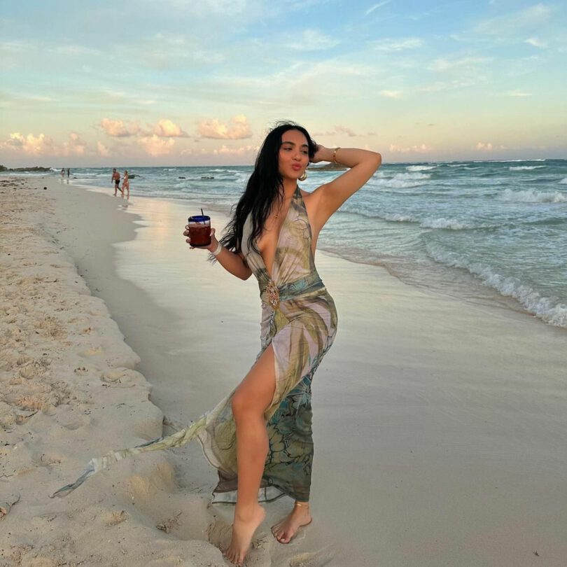 Stella Hudgens Sexy Dress Legs Cleavage Beach