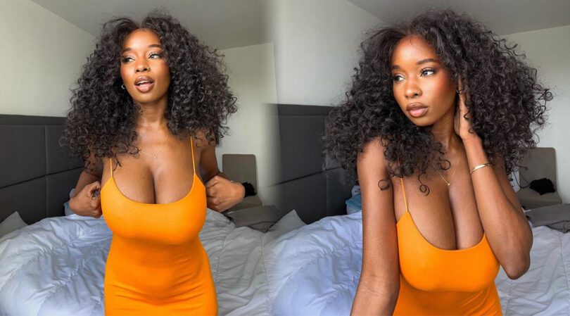 Breast Marvels: Princia G’s Unrestrained Allure in Orange Dress Exposé!