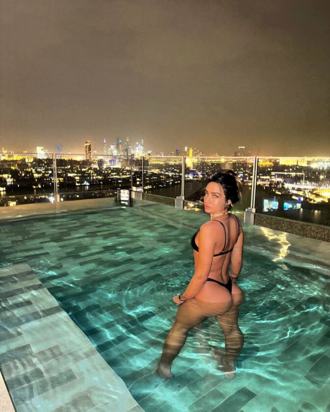 Sommer Ray Poses In A Tiny Thong Bikini By The Pool, Showcasing Her Perfect Ass