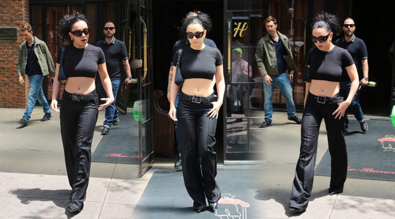 Charli XCX’s Hard Nipples on Full Display: Braless in Tight Black Top!