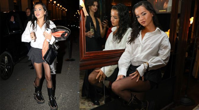 Chic and Stunning: Isabela Merced Shines in Mini Skirt and Stockings in Paris