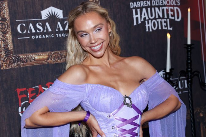 Alexis Ren Haunted Hotel Purple Dress Cleavage Legs