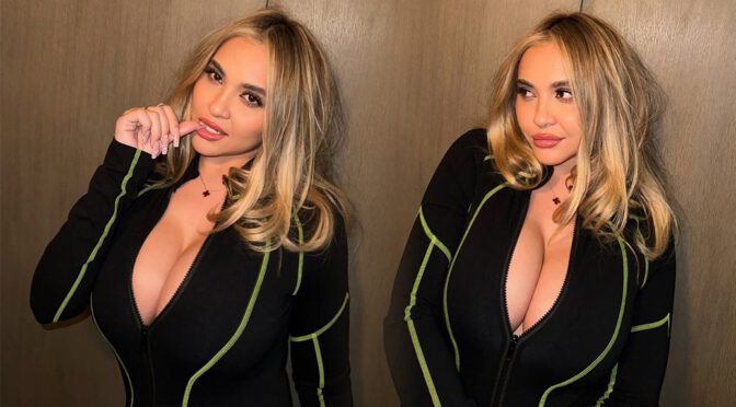 Stella Hudgens Busts Out—Massive Boobs Barely Contained in That Zipper