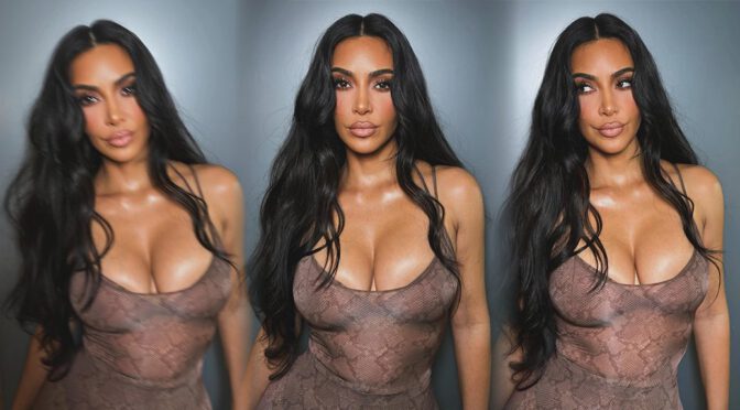 Kim Kardashian’s Huge Breasts Pour Out of Tight Snakeskin Dress