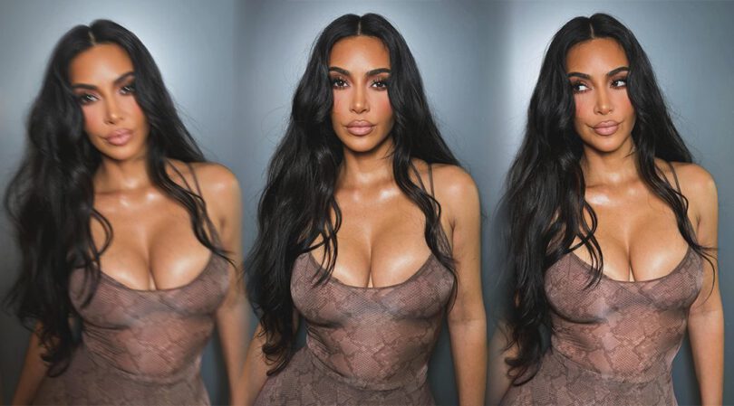 Kim Kardashian’s Huge Breasts Pour Out of Tight Snakeskin Dress