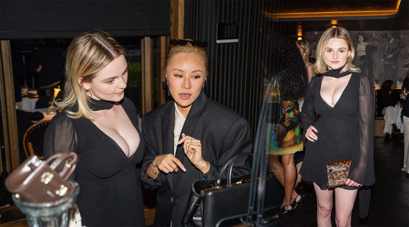 Morgan Lily Shows Off Massive Cleavage in Black Mini Dress