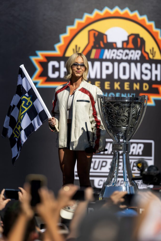 Sydney Sweeney Sexy Trackside Leather Shorts Bare Thighs