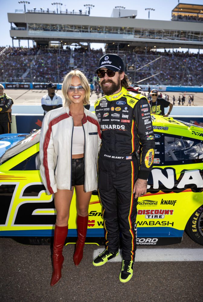 Sydney Sweeney Sexy Trackside Leather Shorts Bare Thighs