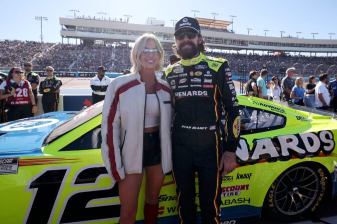 Sydney Sweeney Sexy Trackside Leather Shorts Bare Thighs