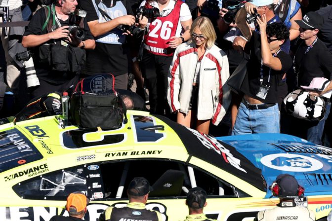 Sydney Sweeney Sexy Trackside Leather Shorts Bare Thighs