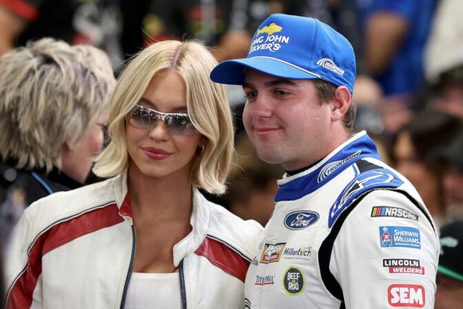 Sydney Sweeney Sexy Trackside Leather Shorts Bare Thighs