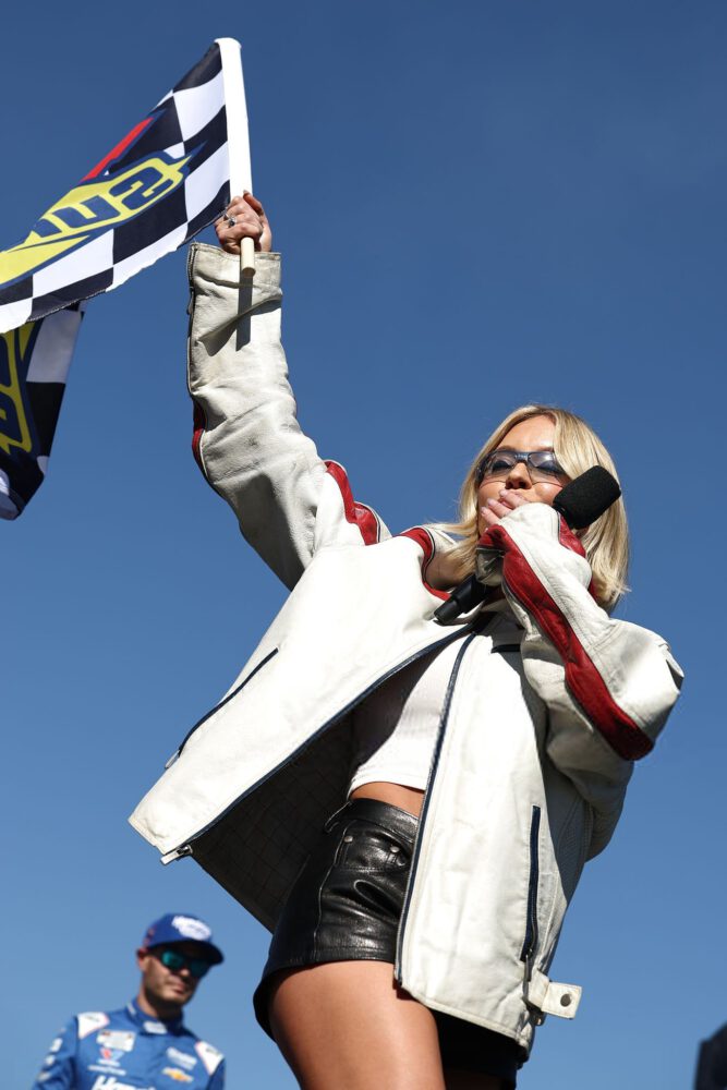 Sydney Sweeney Sexy Trackside Leather Shorts Bare Thighs