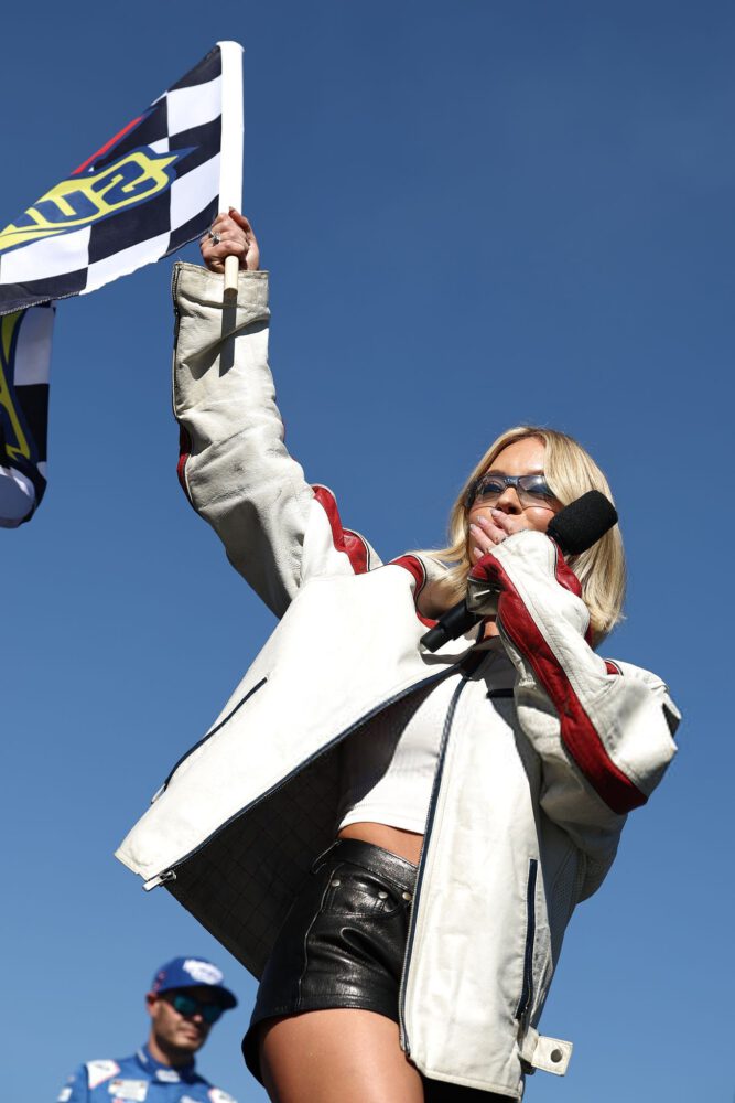 Sydney Sweeney Sexy Trackside Leather Shorts Bare Thighs