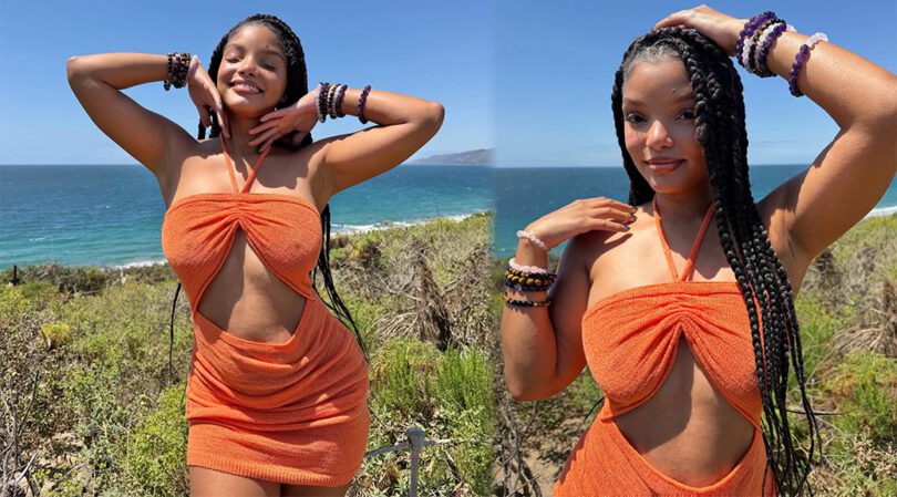 Bralless Halle Bailey Flashes Serious Pokies in Skimpy Orange Mini During Beach Shoot