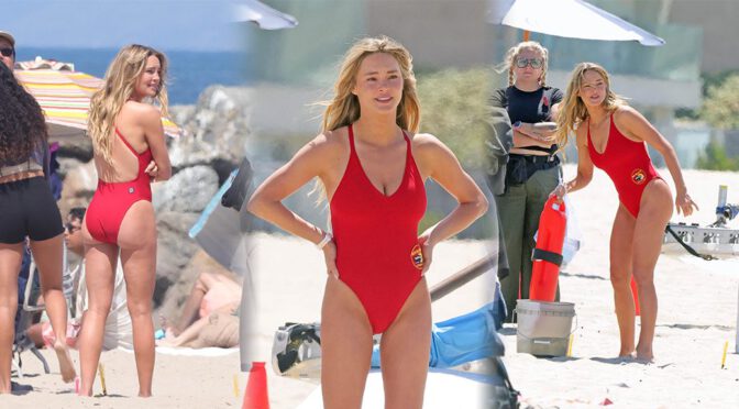 Hassie Harrison’s Tight Red One Piece Clings to Her Perfect Boobs and Ass on Baywatch Set