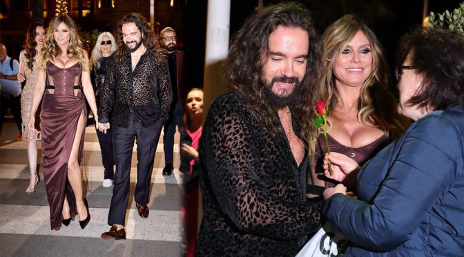 Heidi Klum Busts Out of Tight Corset with Waist-High Slit Showing off Toned Thighs and Boobs