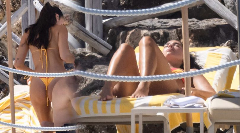 Dua Lipa Flashes Her Ass in Tiny Yellow Bikini During Wild Italian Getaway
