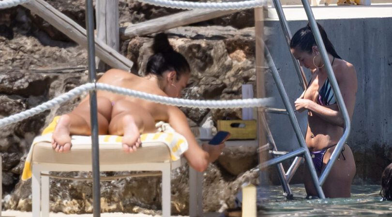 Bare Ass Tease: Dua Lipa Goes Topless on Rocky Beach with Callum Turner