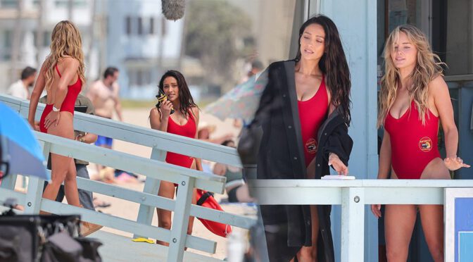Hassie Harrison’s Massive Cleavage and Booty Explode in Tight Red Baywatch Swimsuit