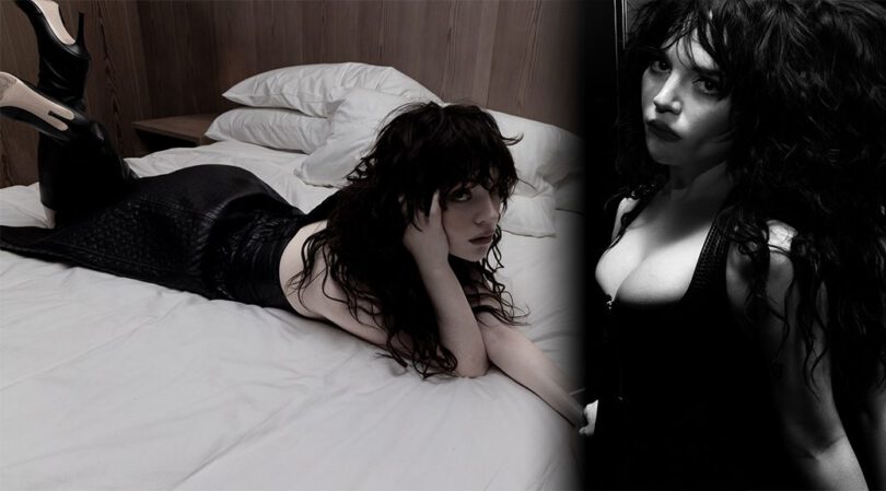 Sophie Thatcher Teases Massive Cleavage in Tight Leather Top on Bed