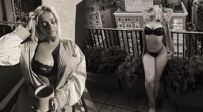 Bebe Rexha’s Birthday Gift to Fans: See-Through Lace Bra Barely Holding Her Huge Breasts on a New York Rooftop