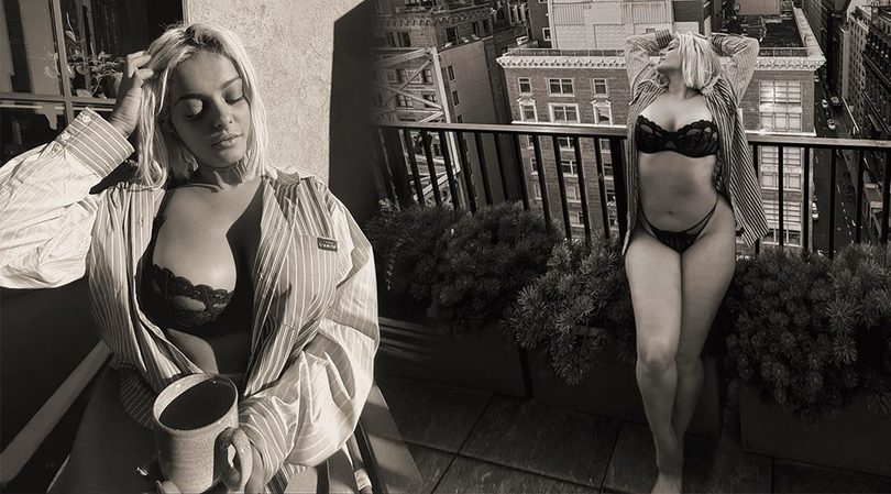 Bebe Rexha’s Birthday Gift to Fans: See-Through Lace Bra Barely Holding Her Huge Breasts on a New York Rooftop