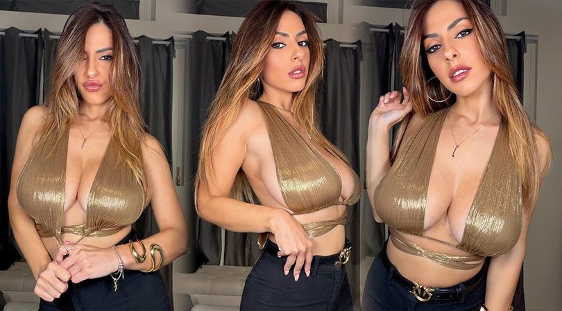 Maddalena Cabizzosu Barely Contains Her Massive Bust in a Stripped-Down Gold Halter