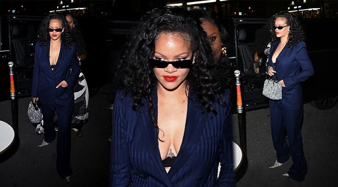 Rihanna’s Deep-V Navy Suit Leaves Almost Nothing to the Imagination After Celine’s Paris Show