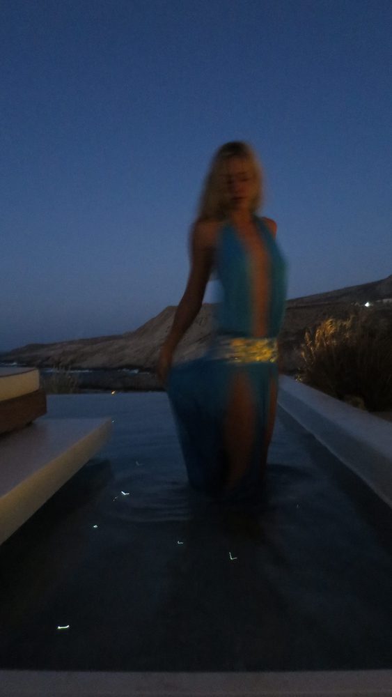 Alexis Ren Braless Blue Dress Mykonos Pool Night