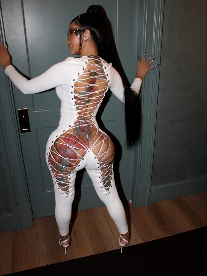Cardi B White Catsuit Cleavage Tattooed Ass Fur Coat