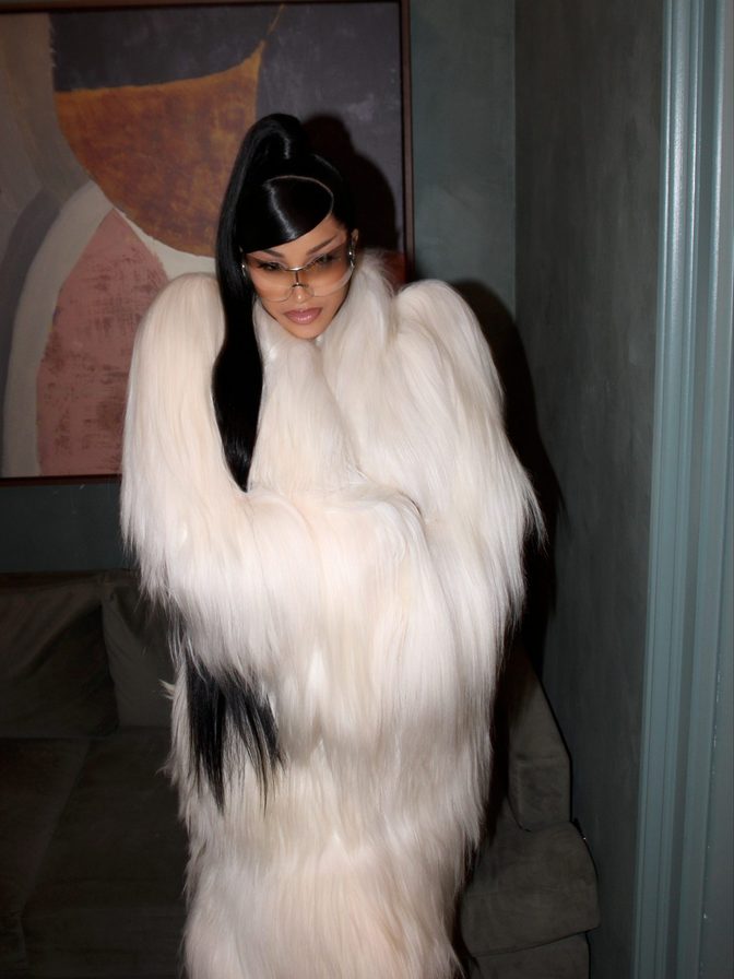 Cardi B White Catsuit Cleavage Tattooed Ass Fur Coat
