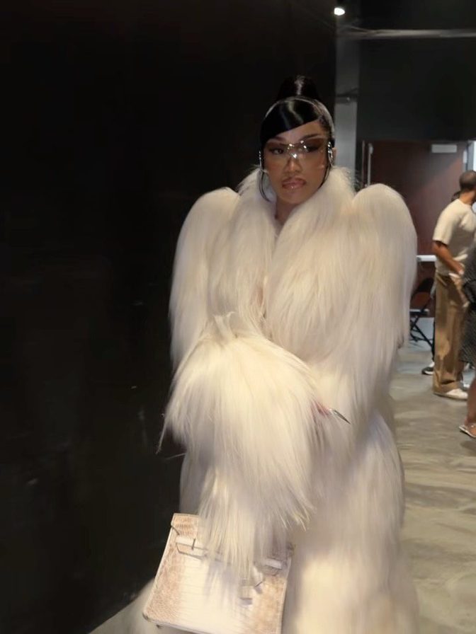 Cardi B White Catsuit Cleavage Tattooed Ass Fur Coat