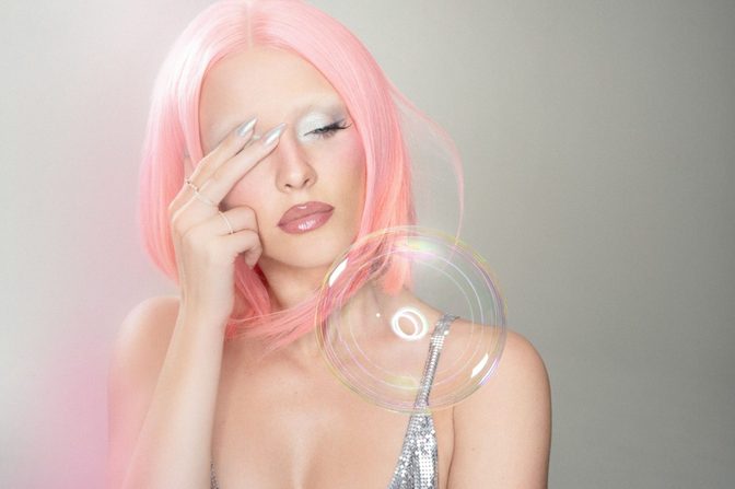 Zara Larsson Sexy Black Bra Pink Wig Allure