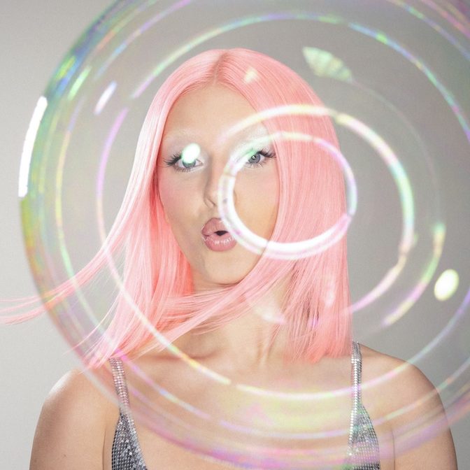 Zara Larsson Sexy Black Bra Pink Wig Allure