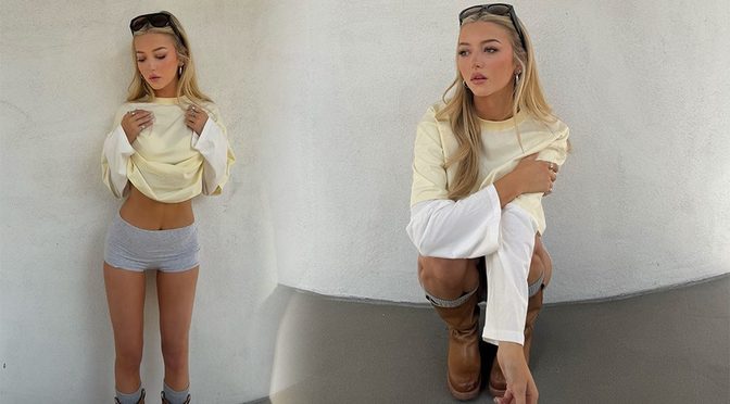 Emily Dobson Lifts Her Shirt to Reveal Bare Midriff and Legs in Tiny Micro Shorts