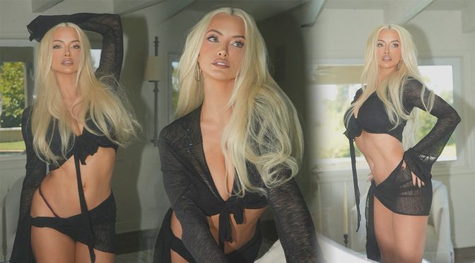 Lindsey Pelas Ties Up That Sheer Black Top and Lets the Curves Do the Talking