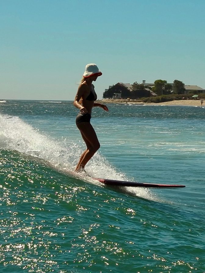 Alexis Ren Floral Bikini Surfing Red Board Curves