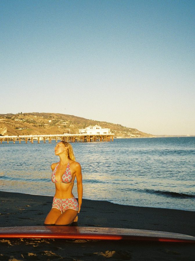Alexis Ren Floral Bikini Surfing Red Board Curves