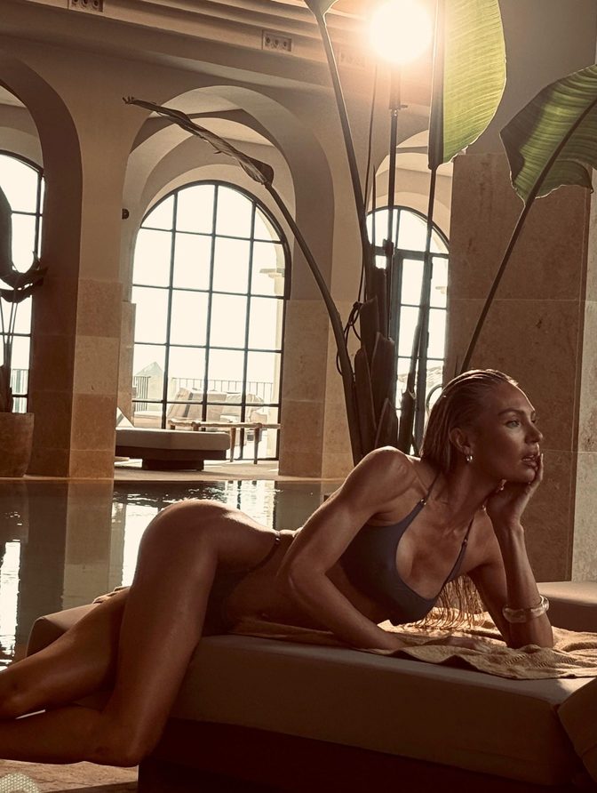 Candice Swanepoel Topless Hair Covering Green Velvet Chair Lace Pants